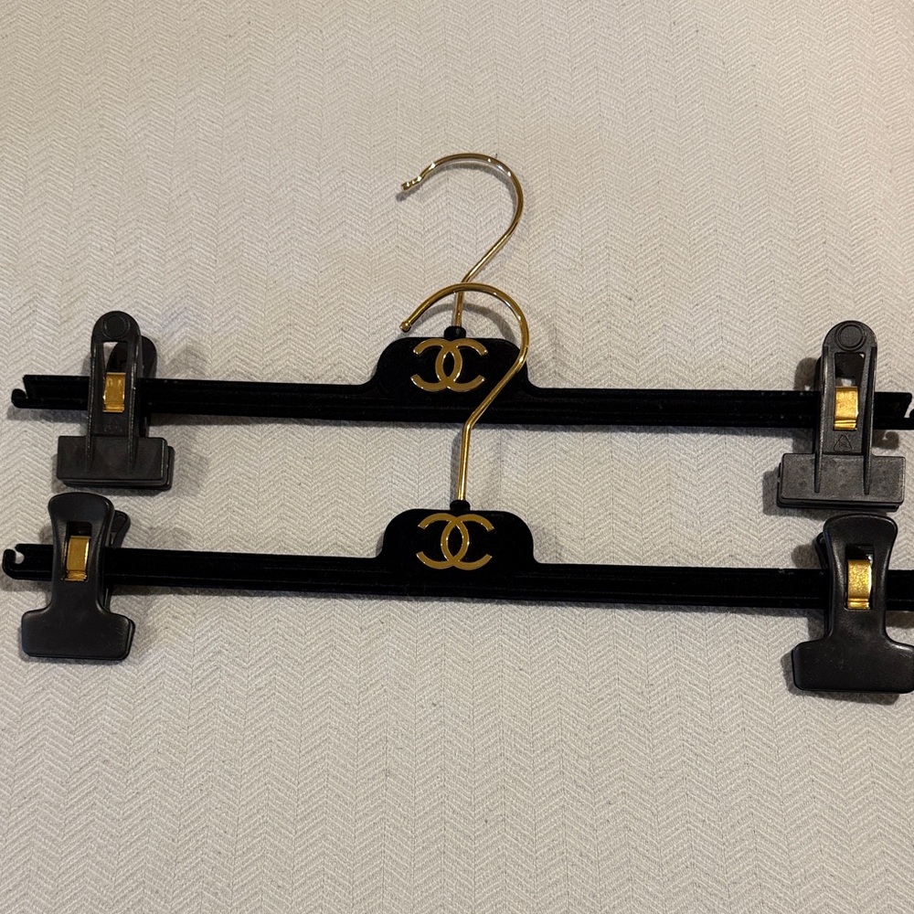 CHANEL Black and Gold Clip Hangers